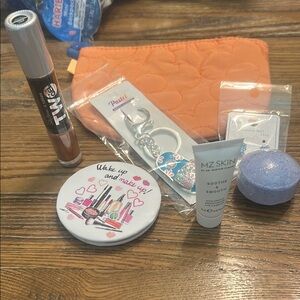 Orange Quilted Pouch with Beauty Accessories